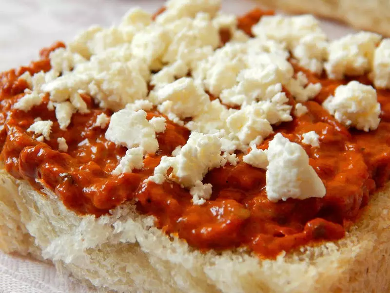 Ajvar and cheese on bread - a Balkan fave