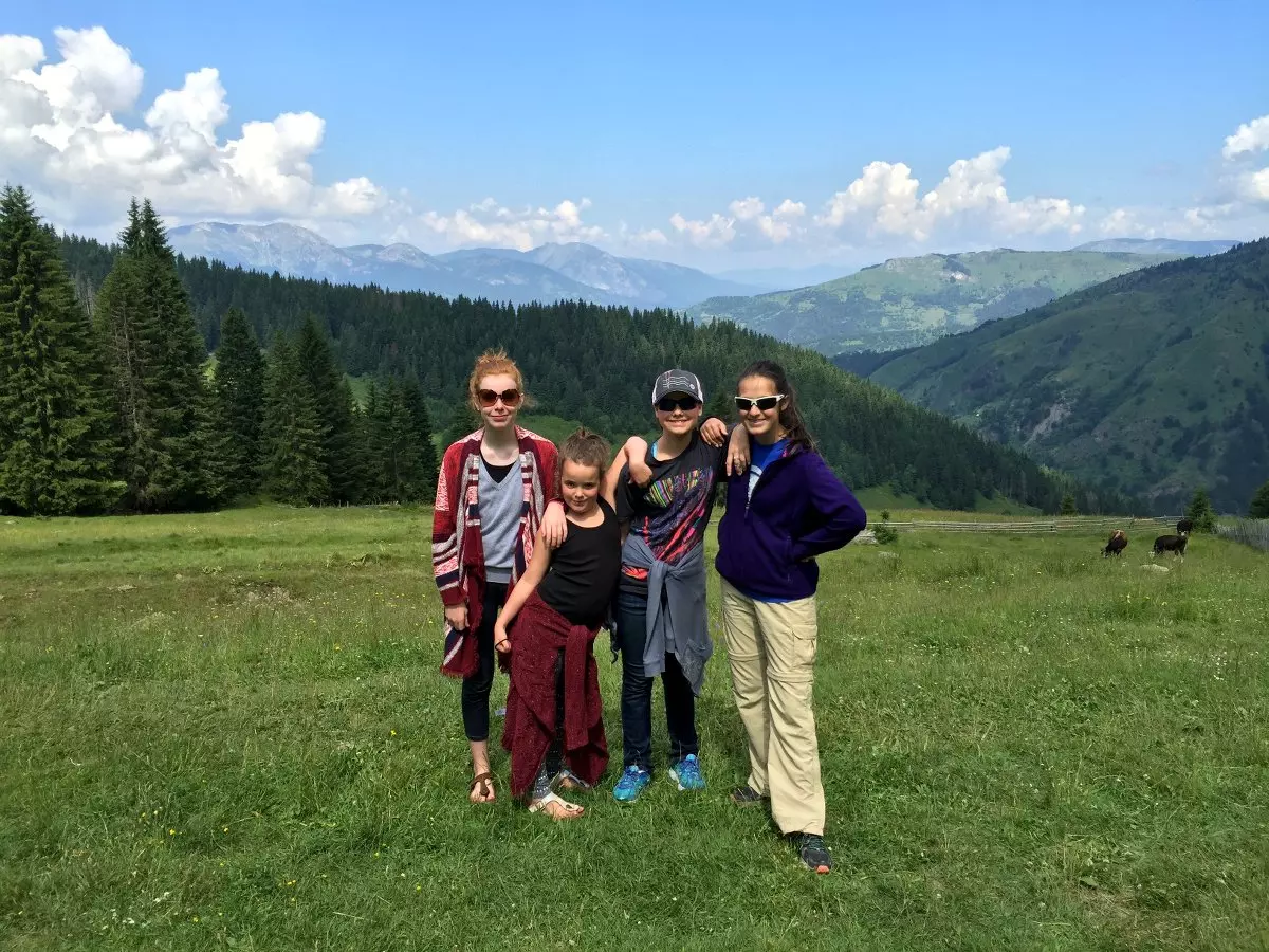 Girlfriends loving time together in the mountains