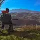 Local boy looking out over Mount Bjelasica