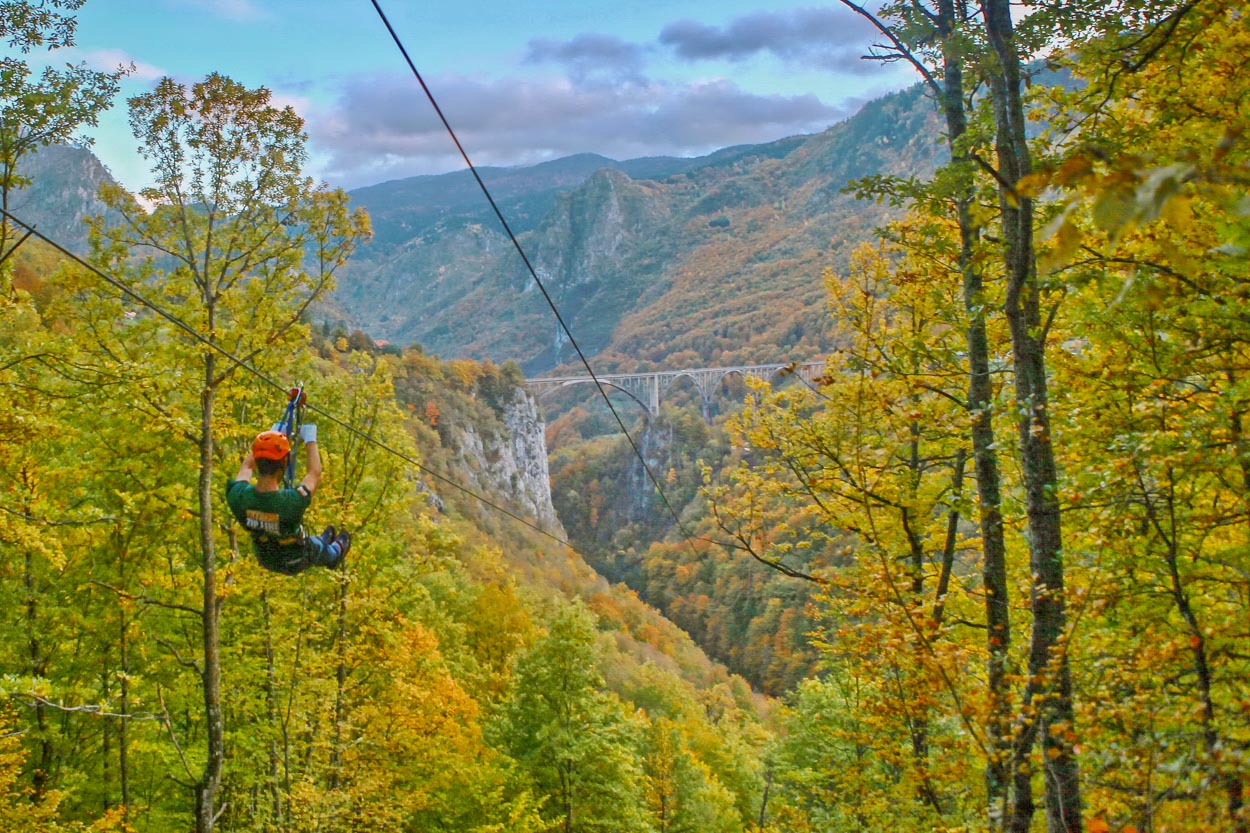 Zip lining across Tara Canyon - longest zipline in Montenegro