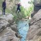 Jumping into pool while canyoning in Montenegro