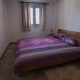 King size bed at Lustica farm stay in Montenegro