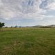 Grazing field for cattle at farm stay near Podgorica, Montenegro