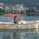 Captain and family boating away in Boka Bay