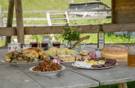 Farm to table organic foods served outdoors on wooden table